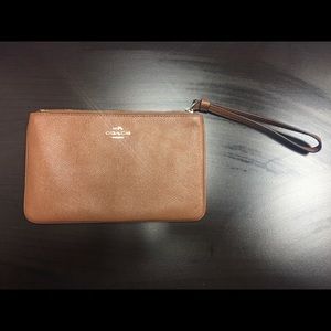 Coach tan wristlet